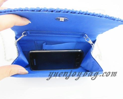 Fold over ruffled Blue satin evening bag interior