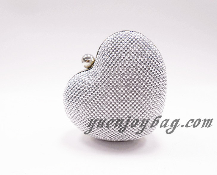 Ladies' Heart shaped aluminium beaded clutch bag front view Ladies' Heart shaped aluminium beaded clutch bag front view