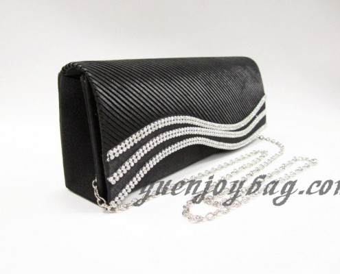 Black pleated Satin clutch purse with crystal rhinestone - side view Black pleated Satin clutch purse with crystal rhinestone - side view