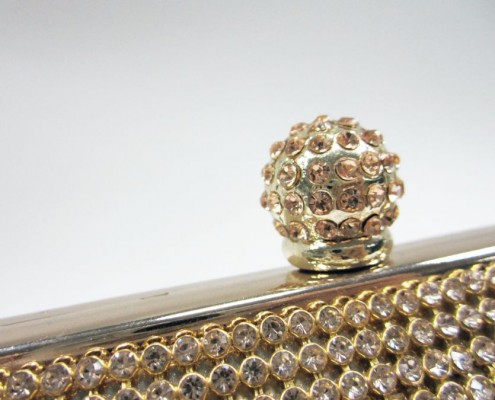 Crystal rhinestone gold evening purse with diamond closure Crystal rhinestone gold evening purse with diamond closure