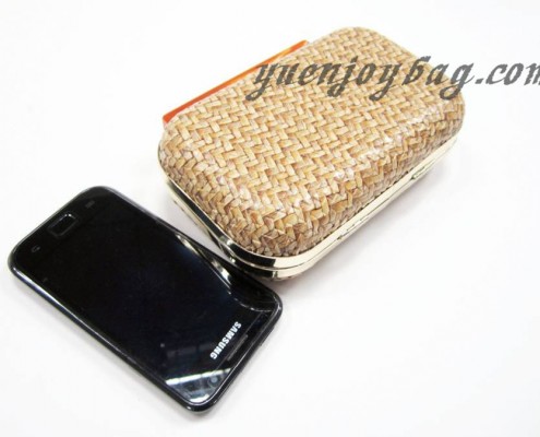Woven PU leather day clutch bag with metal frame - contrast with mobile Woven PU leather day clutch bag with metal frame - contrast with mobile