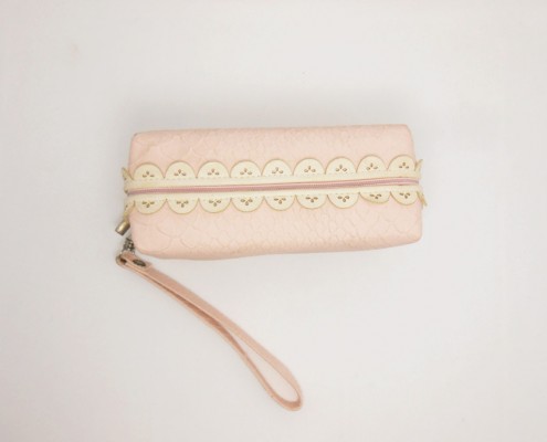 lady women's pink cosmetic wristlet purse