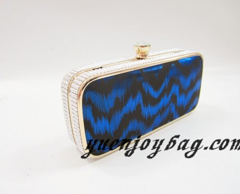 Gold metal frame Blue wave pattern PU leather clutch bags with rhinestone clasp - side view Gold metal frame Blue wave pattern PU leather clutch bags with rhinestone clasp - side view