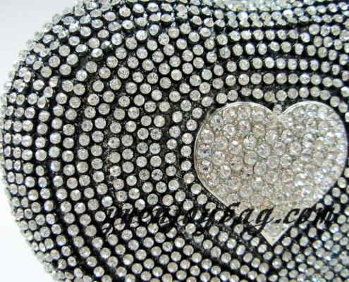 Grey heart shaped evening clutch bag with all over diamond - detail view Grey heart shaped evening clutch bag with all over diamond - detail view